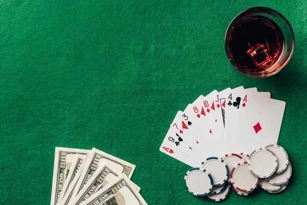 Baccarat table with dealer and player cards visible